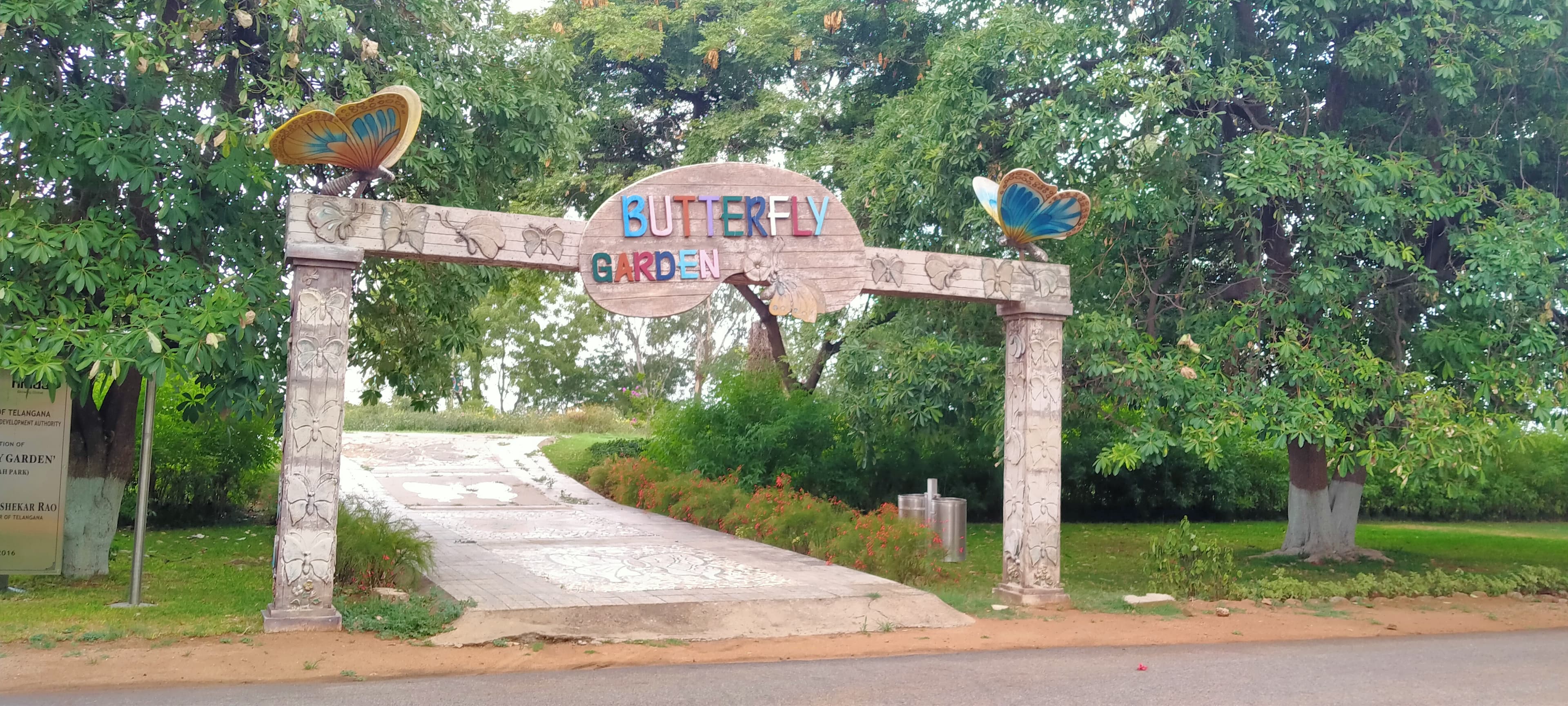 N/A (Image depicts a butterfly garden entrance, not a specific butterfly species)