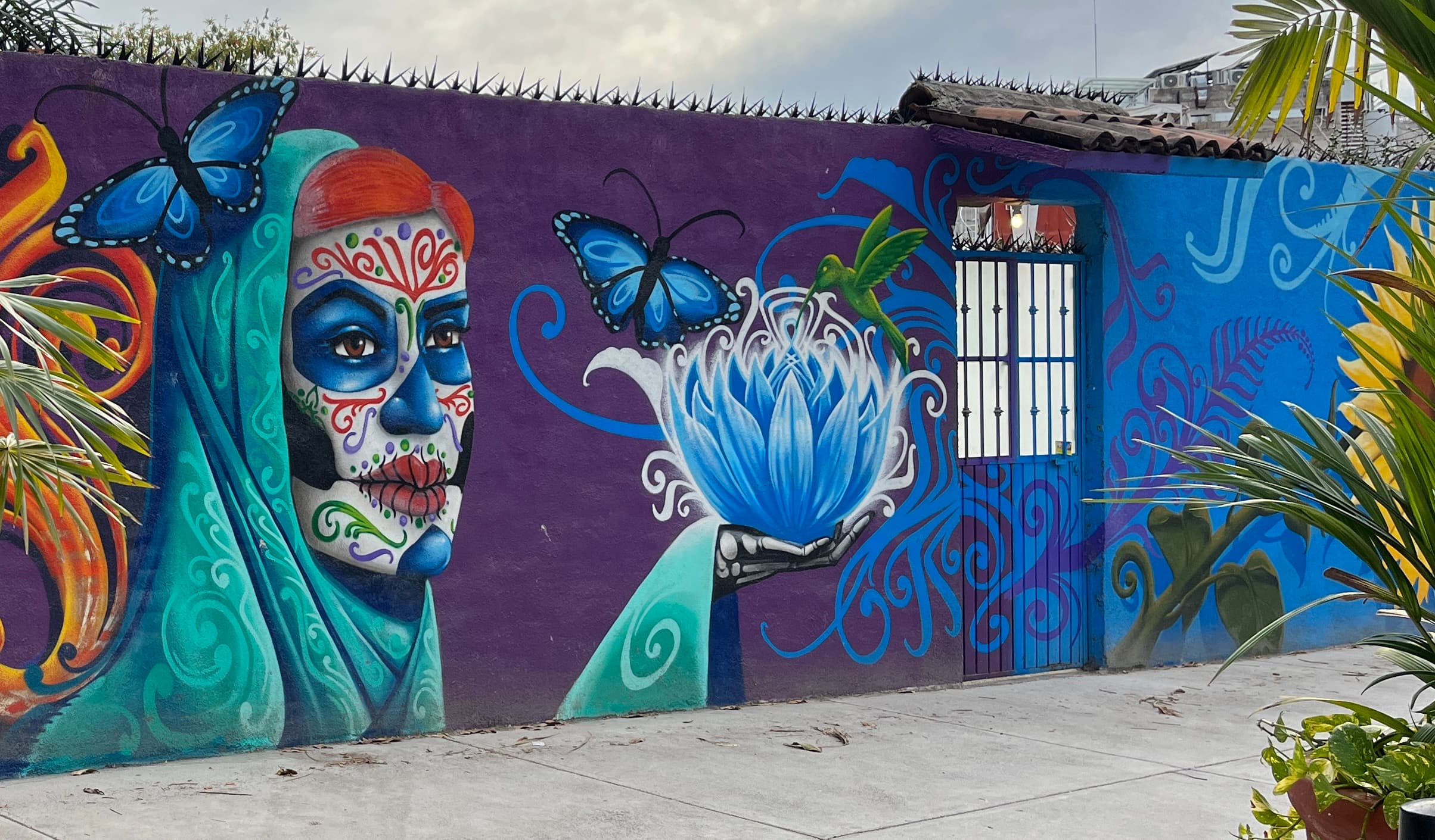 N/A (Stylized butterfly in a mural)